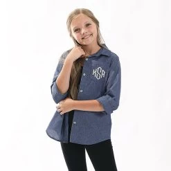 Monogrammed Kids Button Down Tunic 11 Monogrammed Kids Button Down Tunic -Fashion Clothing Store cUR studio shot of youth girl in chambray button down tunic