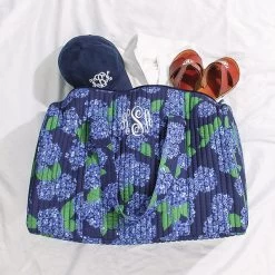 Monogrammed Quilted Weekender -Fashion Clothing Store cqh spill shot of blue hydrangea quilted weekender