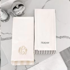 Monogrammed Hand Towel Set -Fashion Clothing Store dAZ monogram and name on khaki and grey hand towels on bathroom marble