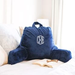 Fashion Clothing Store -Fashion Clothing Store ed5 navy lounge pillow cover on bed with book