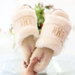 Monogrammed Fuzzy Slippers -Fashion Clothing Store fDP ivory fuzzy slippers in lobby