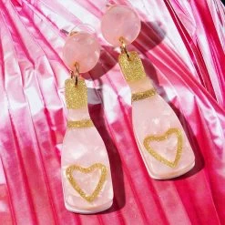 Rosé Earrings -Fashion Clothing Store hAB pop the bubbly earrings on pink satin