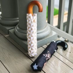 Monogrammed Umbrella -Fashion Clothing Store hab duo monogrammed umbrellas on porch