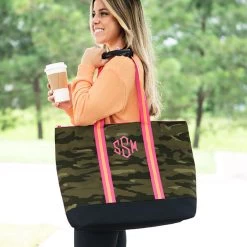 Monogrammed Large Zip Top Tote -Fashion Clothing Store iot girl holding camo large zip top tote over the shoulder with coffee