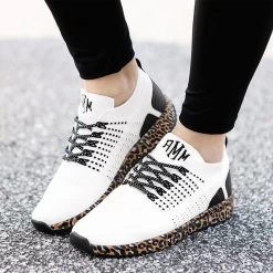 Monogrammed Leopard Bottom Sneakers -Fashion Clothing Store jJ0 close up of girl wearing cheetah leopard bottom sneakers