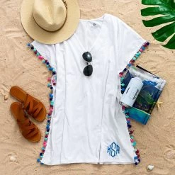 Monogrammed Pom Pom Cover Up 10 Monogrammed Pom Pom Cover Up -Fashion Clothing Store lf3 monogrammed white pom pom cover up OOTD with sandals hat and palm