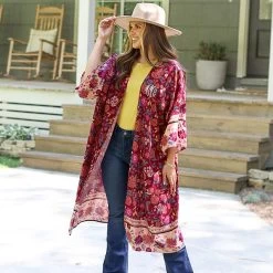 Monogrammed Duster 10 Monogrammed Duster -Fashion Clothing Store loZ burgundy floral duster on girl with yellow shirt and denim touching wide brim hat outiside cabin new