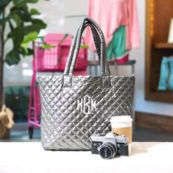 Monogrammed Diamond Quilted Tote -Fashion Clothing Store mCD metallic silver diamond quilted tote on bench