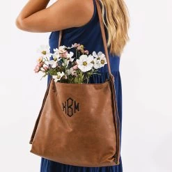 Monogrammed Convertible Backpack 11 Monogrammed Convertible Backpack -Fashion Clothing Store mDM brown convertible backpack on shoulder
