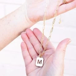 Initial Tag Necklace 6 Initial Tag Necklace -Fashion Clothing Store my9 m initial tag necklace in hands