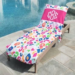 Monogrammed Chair Cover -Fashion Clothing Store nAD monogrammed leopard chair cover on pool