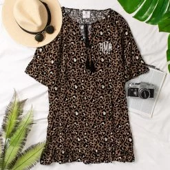 Monogrammed Cover Up -Fashion Clothing Store pST cheetah cover up flatlay with palms camera hat sunglasses