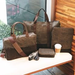 Personalized Waxed Canvas Cooler -Fashion Clothing Store sS2 waxed bag collection on bench