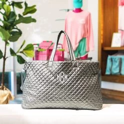 Monogrammed Diamond Quilted Weekender -Fashion Clothing Store teg metallic silver diamond quilted weekender on bench