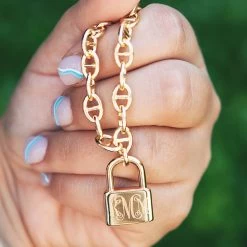 Monogrammed Lock Chain Necklace 9 Monogrammed Lock Chain Necklace -Fashion Clothing Store vbL silver lock chain necklace in hand