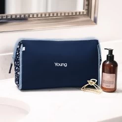 Monogrammed Neoprene Cosmetic Case 18 Monogrammed Neoprene Cosmetic Case -Fashion Clothing Store xdo monogrammed neoprene cosmetic bag in navy ditsy floral on countertop 02