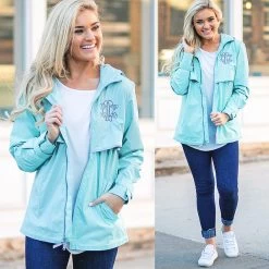 Monogrammed New England Rain Jacket -Fashion Clothing Store yWj monogrammed aqua new england rain jacket with jeans and sneakers